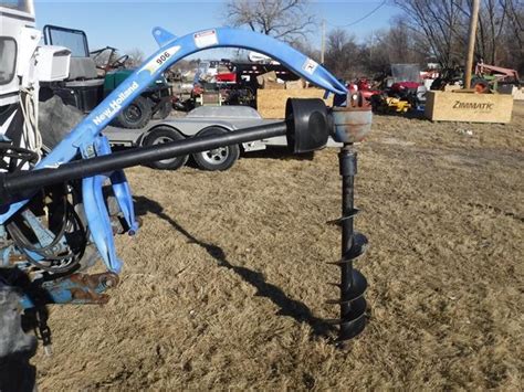 new holland skid steer post hole digger|new holland quick hitch.